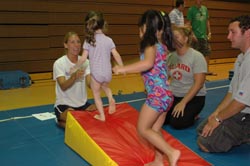 Picture of children learning tumbling.