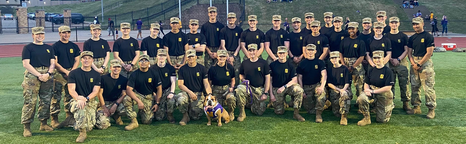 group photo of ROTC cadets at football stadium