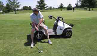 Golfing from the accessible golf cart