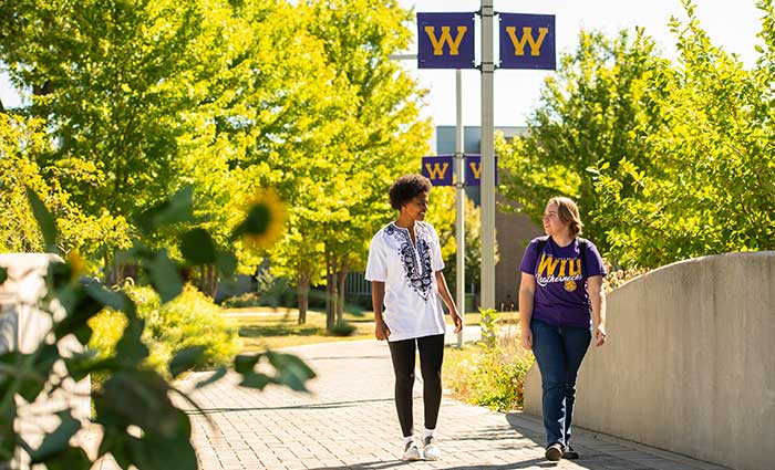 students walking on campus