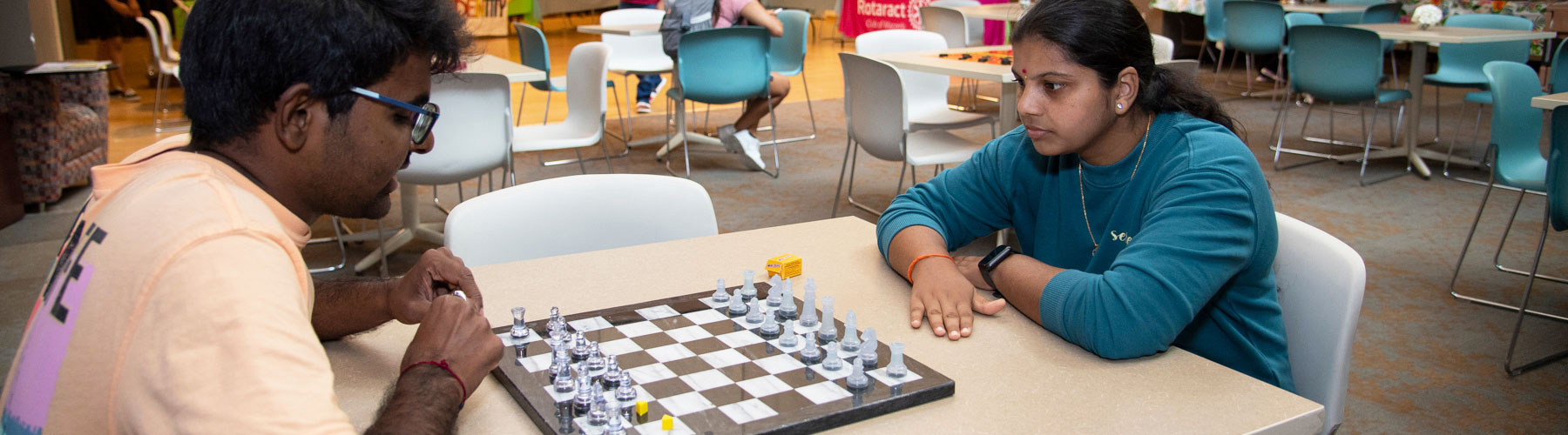 students playing a game of chess