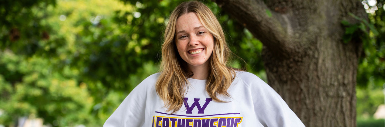 student wearning a Western Illinois University sweatshirt